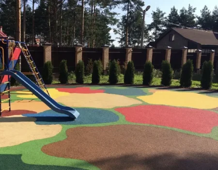 A playground featuring a colorful EPDM rubber flooring surface designed for safety and durability. A playground featuring a colorful EPDM rubber flooring surface designed for safety and durability.
