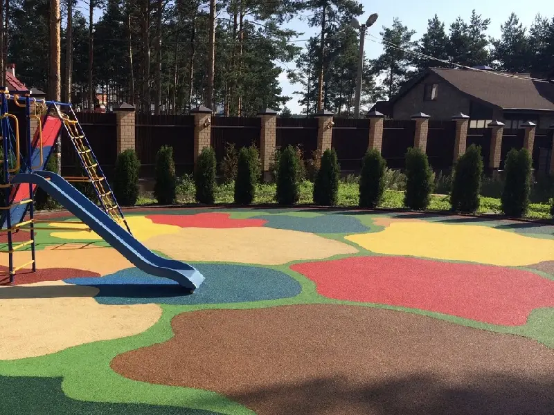 A playground featuring a colorful EPDM rubber flooring surface designed for safety and durability. A playground featuring a colorful EPDM rubber flooring surface designed for safety and durability.
