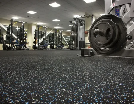 Speckled rubber Gym flooring Dubai in a weight room. Speckled rubber Gym flooring Dubai in a weight room.